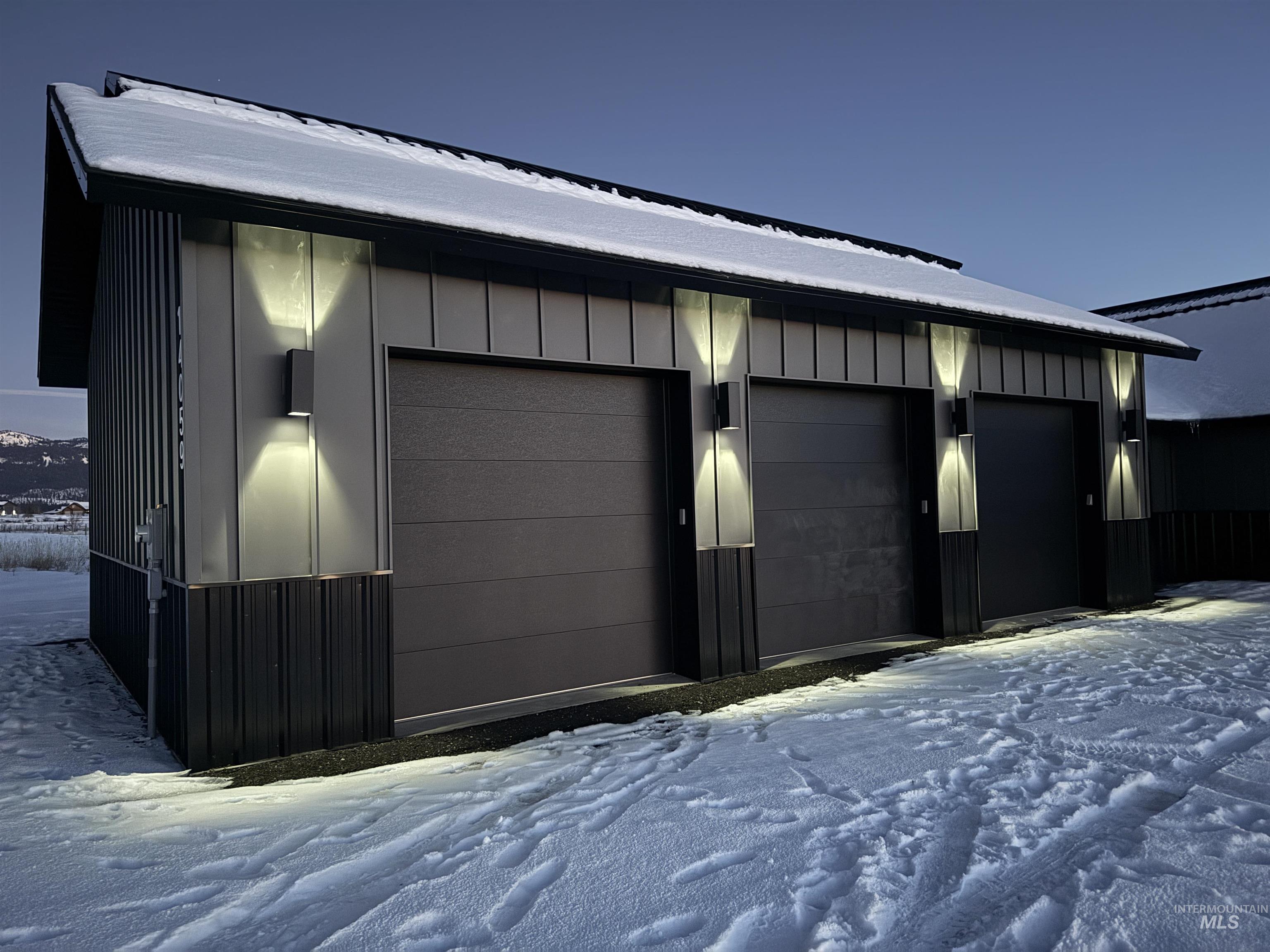 14059 Mulberry McCall, ID 83638 - Photo 2 of 32 View of snow covered garage