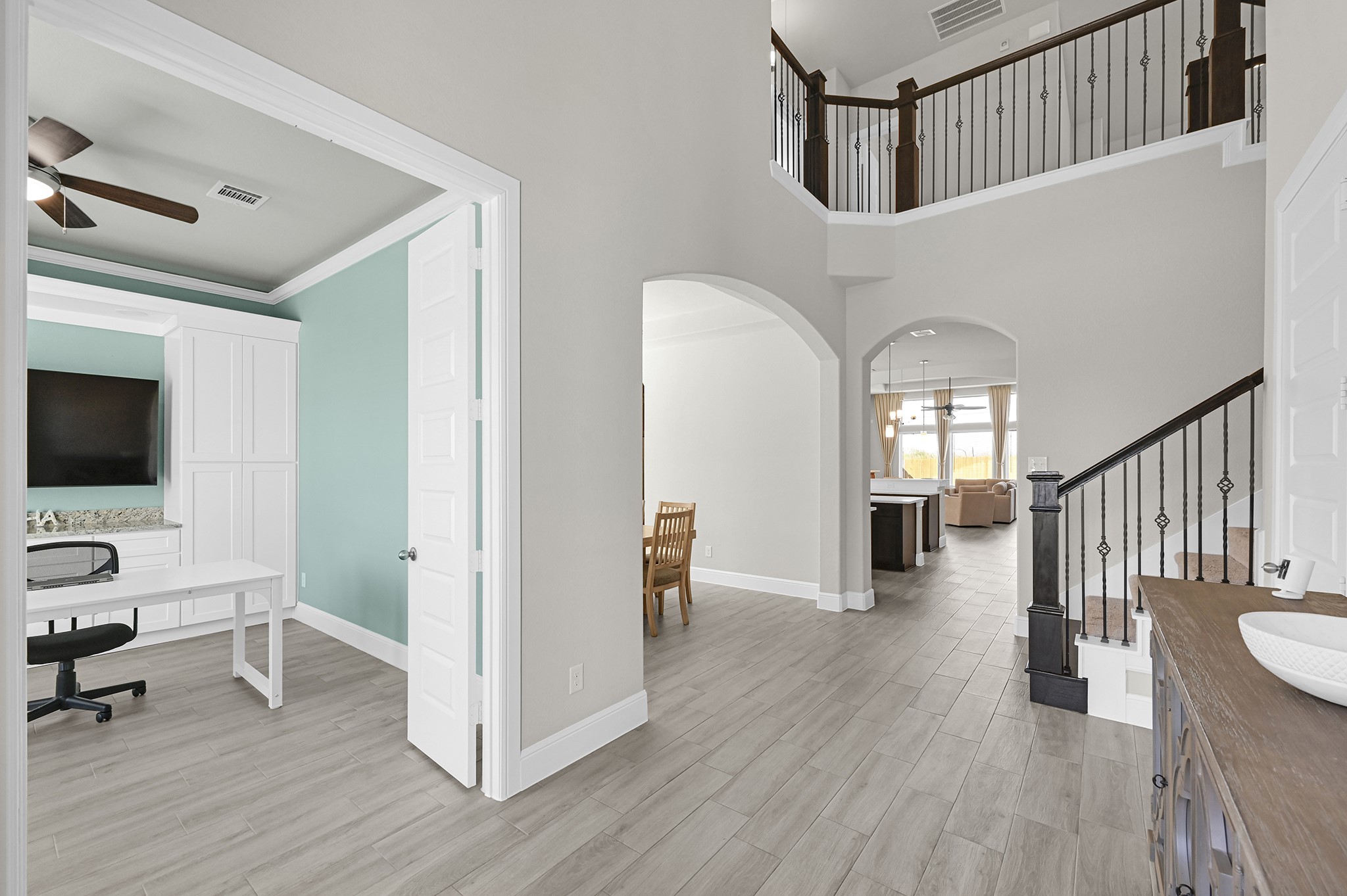 8 Palmero Way Manvel, TX 77578 - Photo 5 of 34 a view of a livingroom with wooden floor and furniture