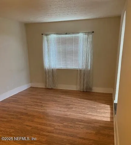 a view of an empty room with window