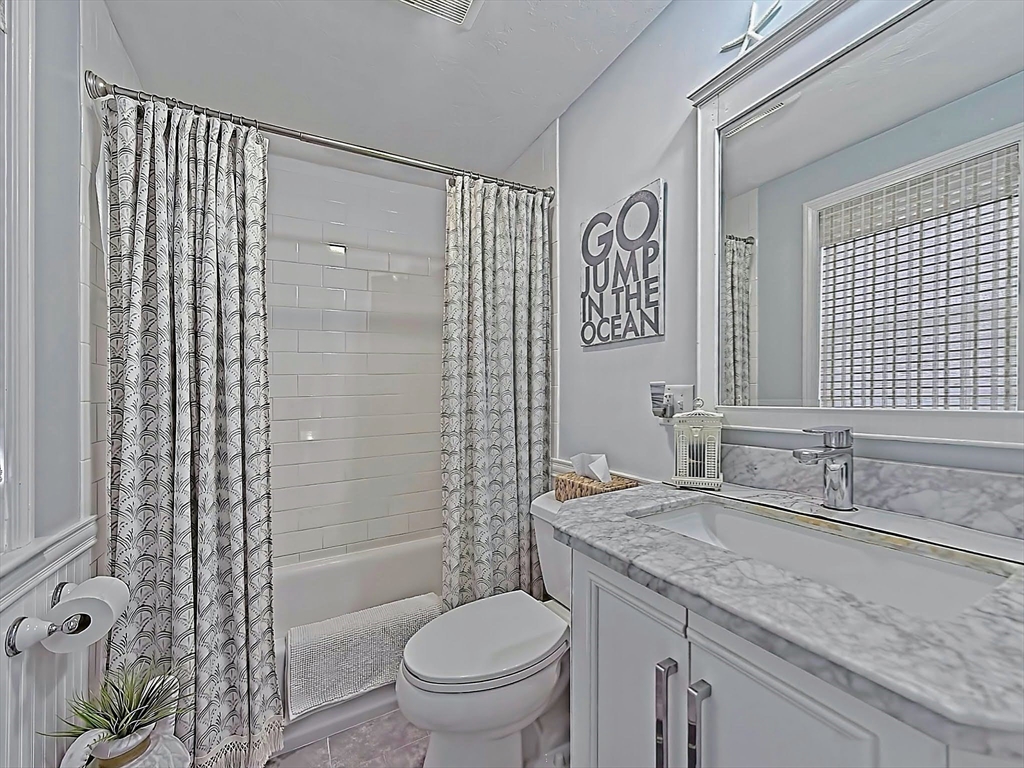 35 Prospect Avenue Hull, MA 02045 - Photo 21 of 42 a bathroom with a granite countertop sink toilet and shower