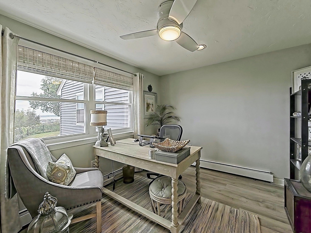 35 Prospect Avenue Hull, MA 02045 - Photo 24 of 42 a living room with furniture and a window