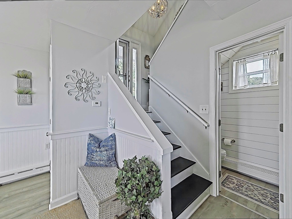 35 Prospect Avenue Hull, MA 02045 - Photo 5 of 42 a view of entryway livingroom and hall with wooden floor