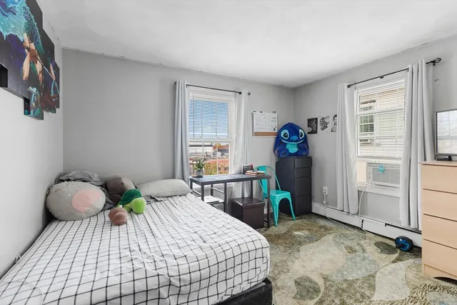 a room with furniture and wooden floor