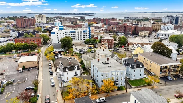 an aerial view of a city with lots of residential buildings