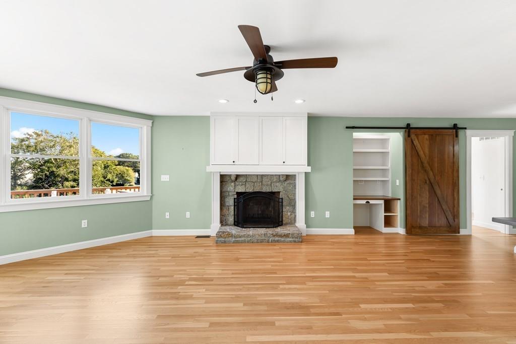8 Doctors Run Rockport, MA 01966 - Photo 13 of 38 an empty room with windows and fireplace