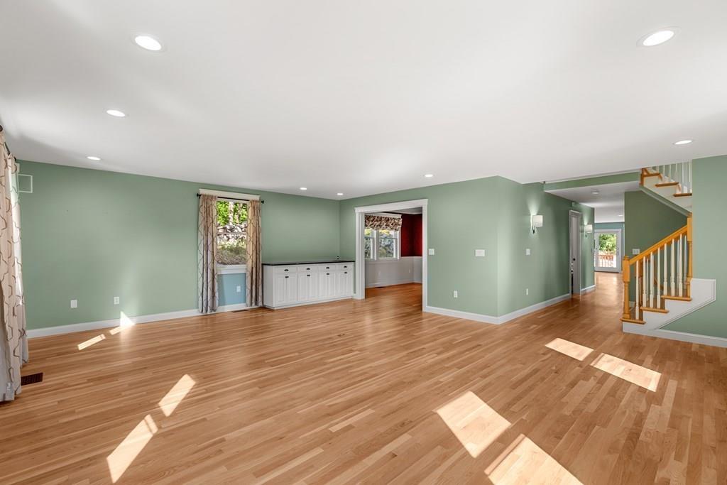 8 Doctors Run Rockport, MA 01966 - Photo 19 of 38 a view of a hallway with wooden floor and a living room