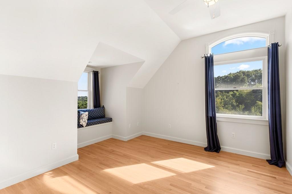 8 Doctors Run Rockport, MA 01966 - Photo 29 of 38 a view of empty room with wooden floor and fan