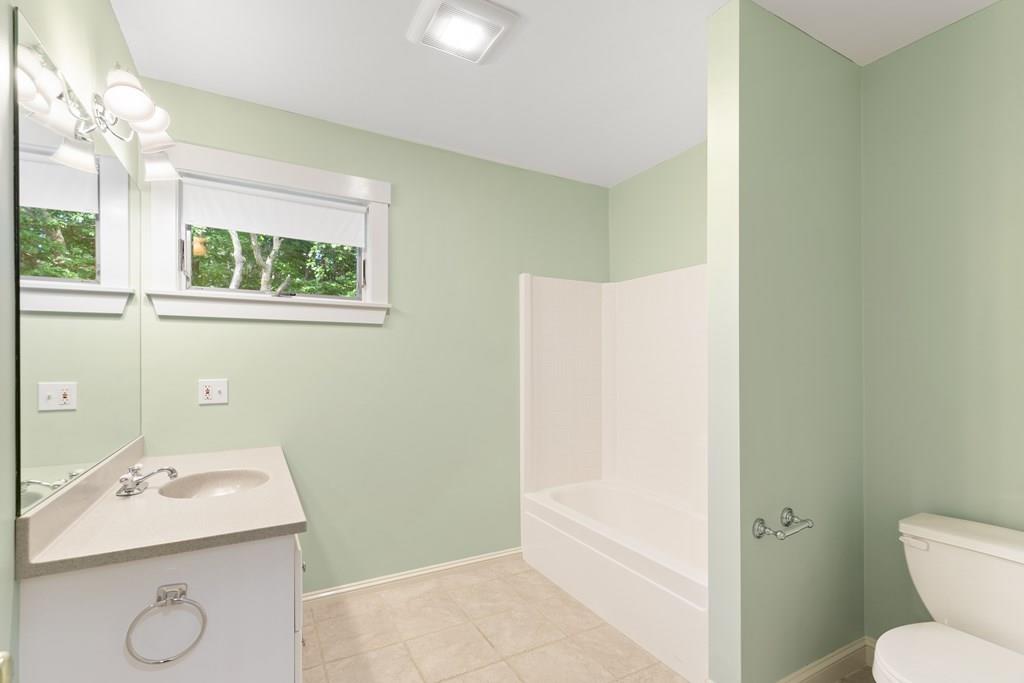 8 Doctors Run Rockport, MA 01966 - Photo 31 of 38 a bathroom with a sink and a mirror