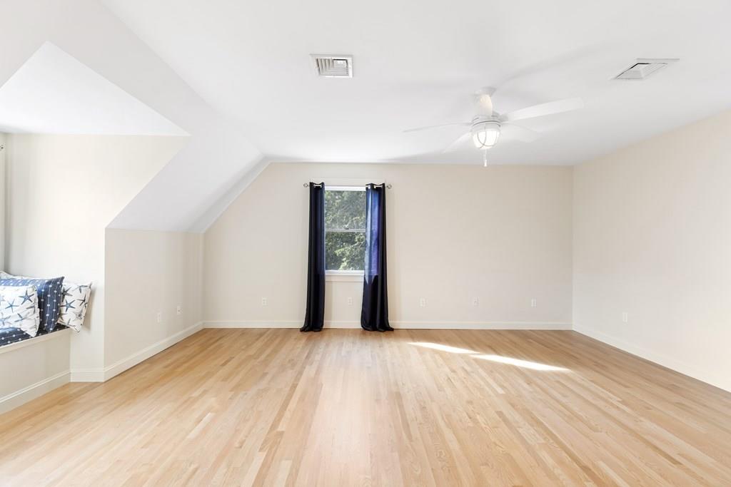 8 Doctors Run Rockport, MA 01966 - Photo 32 of 38 an empty room with wooden floor and ceiling fan