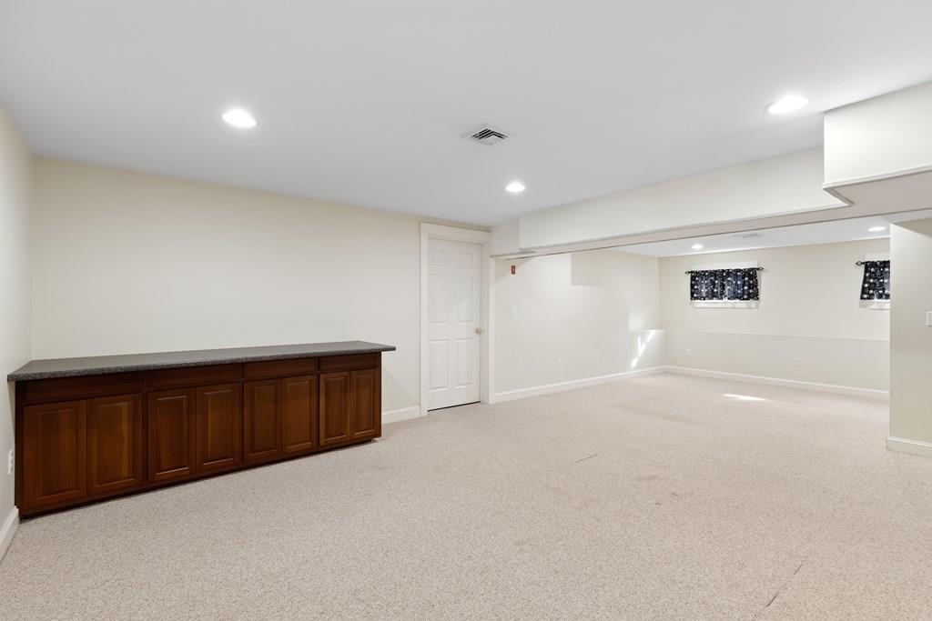 8 Doctors Run Rockport, MA 01966 - Photo 35 of 38 a view of an empty room with wooden floor