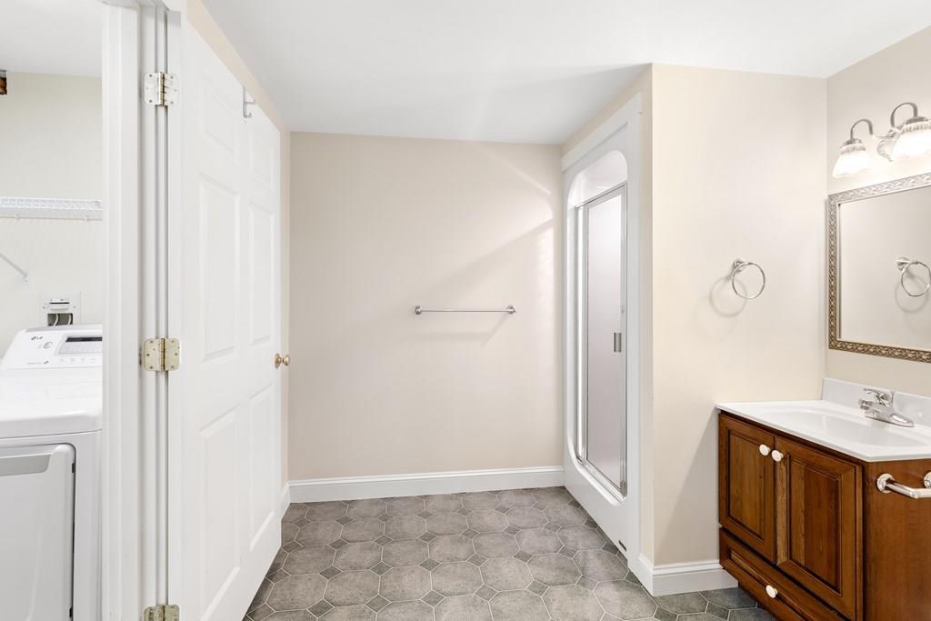 8 Doctors Run Rockport, MA 01966 - Photo 36 of 38 a bathroom with a sink and a mirror