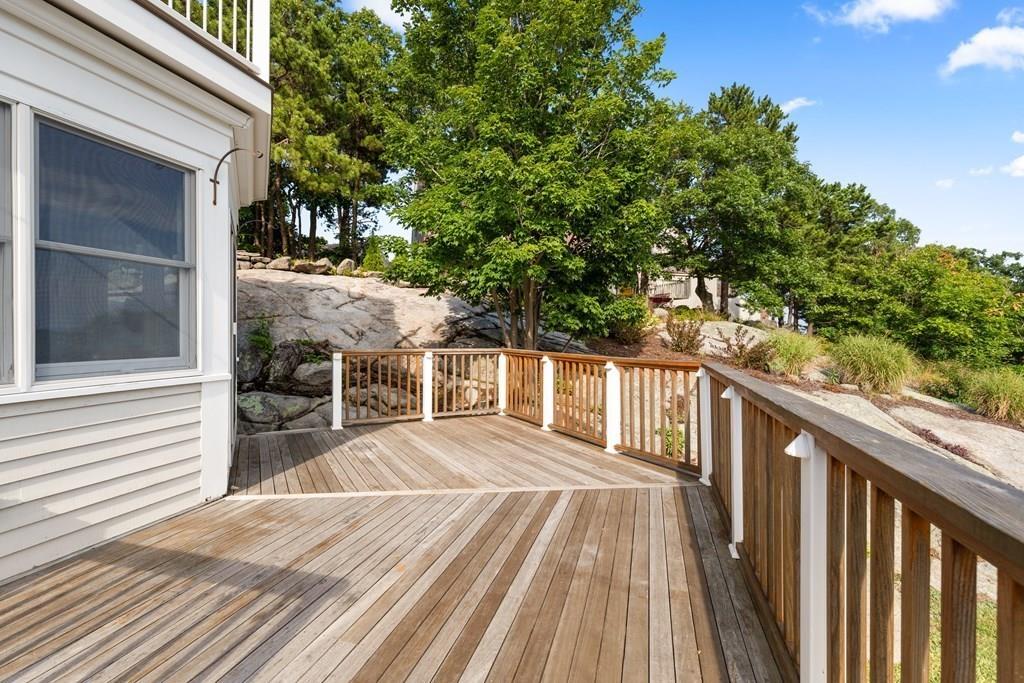 8 Doctors Run Rockport, MA 01966 - Photo 7 of 38 a view of a house with backyard and wooden