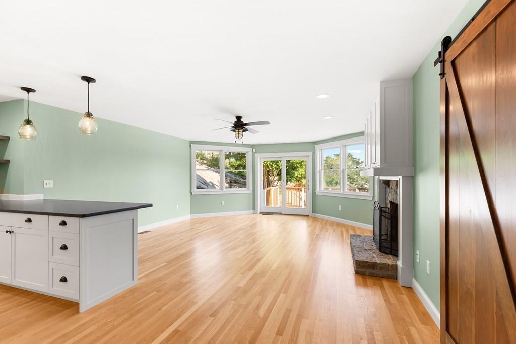 8 Doctors Run Rockport, MA 01966 - Photo 10 of 38 a view of an empty room with wooden floor and a window