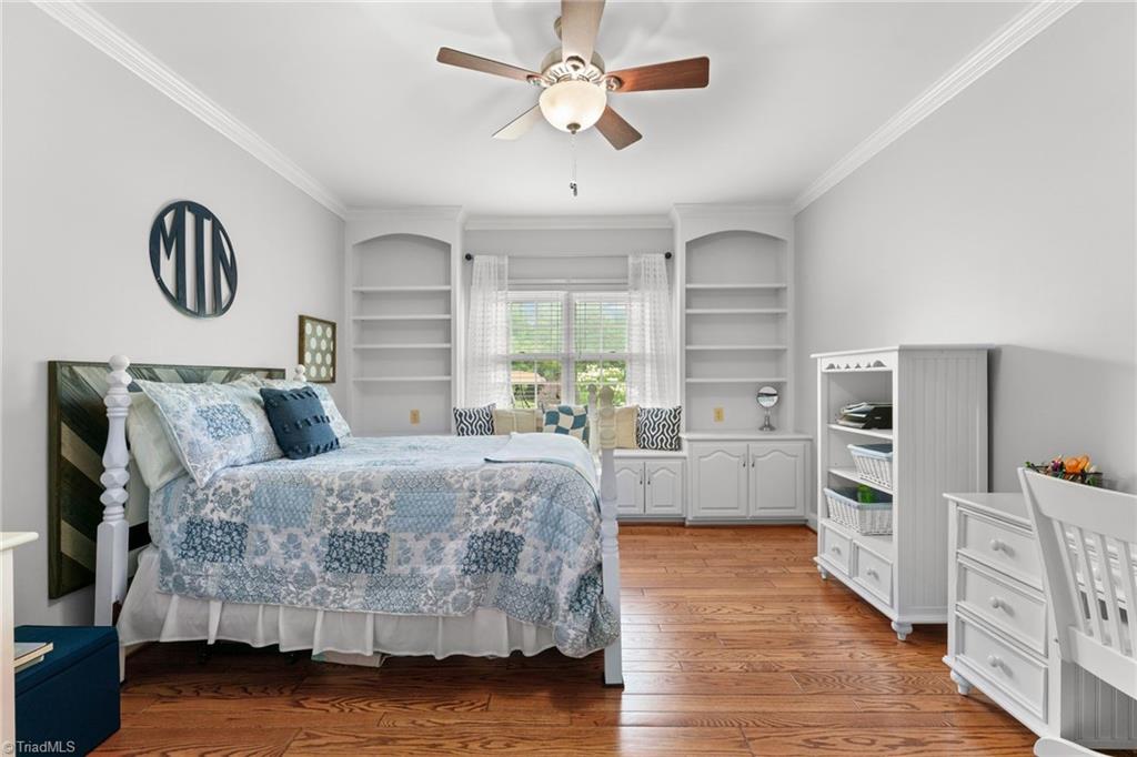 1044 Lasley Road Lewisville, NC 27023 - Photo 27 of 50 Large secondary bedroom with abundant natural light