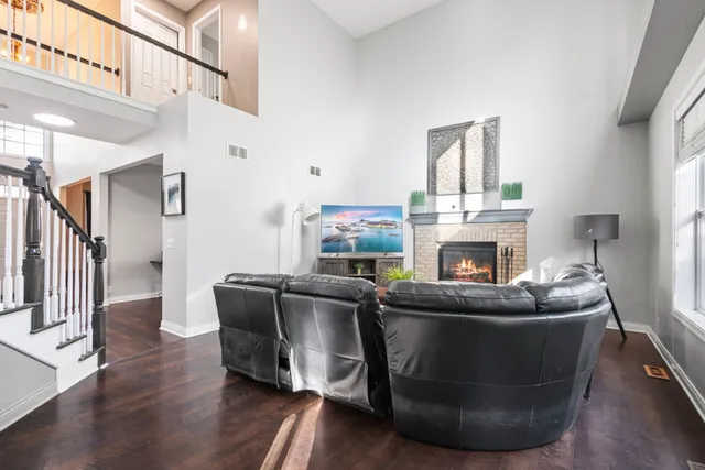 a bathroom with a tub a sink and mirror