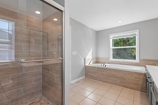 a view of a bedroom with closet