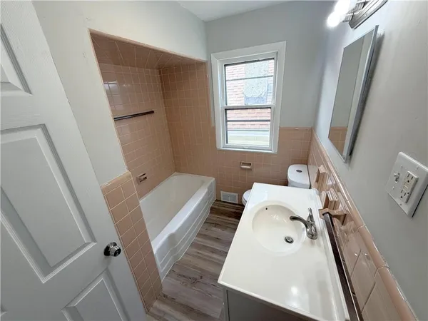 a bathroom with a sink and a tub