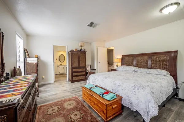 a bathroom with a double vanity sink mirror and a mirror