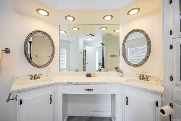 a bathroom with a bathtub and shower