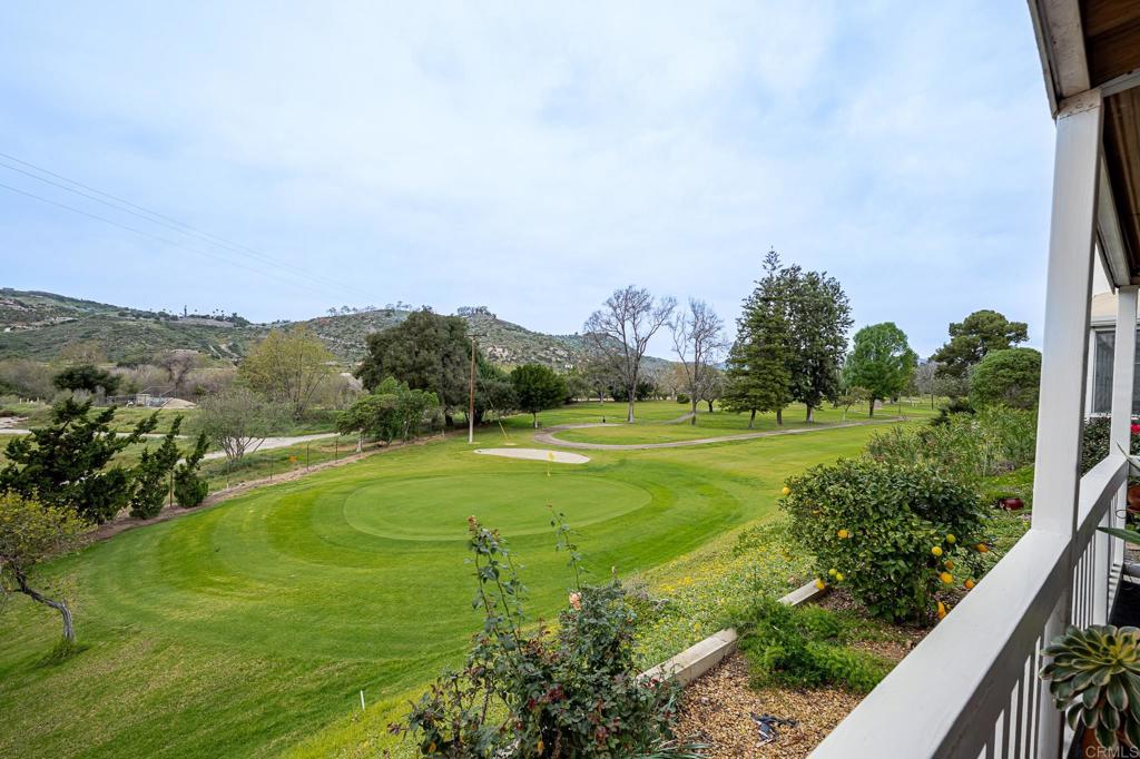 4650 Dulin Road, Unit 229 Fallbrook, CA 92003 - Photo 20 of 53 a view of a grassy field with an trees