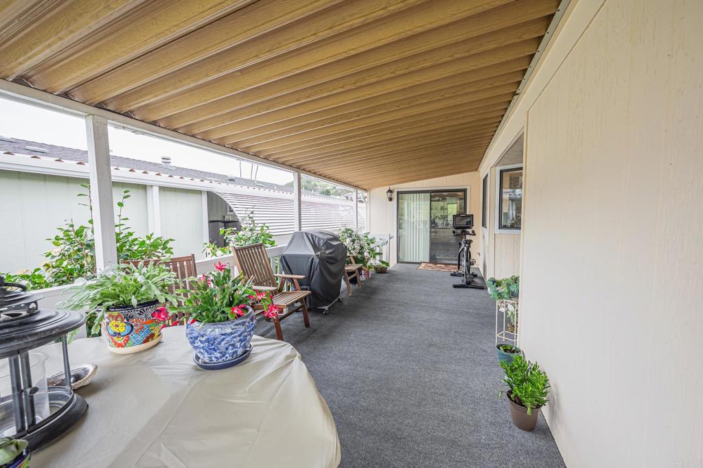 4650 Dulin Road, Unit 229 Fallbrook, CA 92003 - Photo 22 of 53 a view of a house with a patio