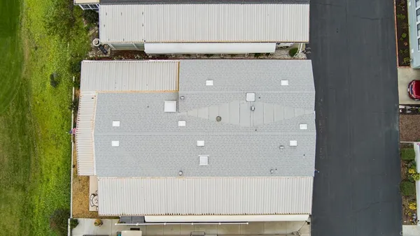 a view of swimming pool with a yard