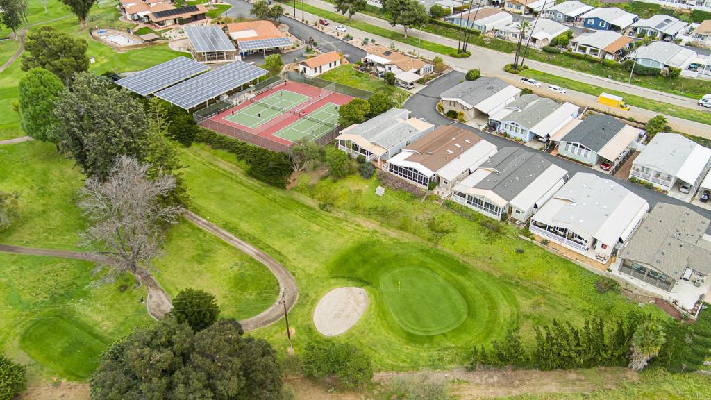 4650 Dulin Road, Unit 229 Fallbrook, CA 92003 - Photo 29 of 53 an aerial view of residential houses with outdoor space and street view