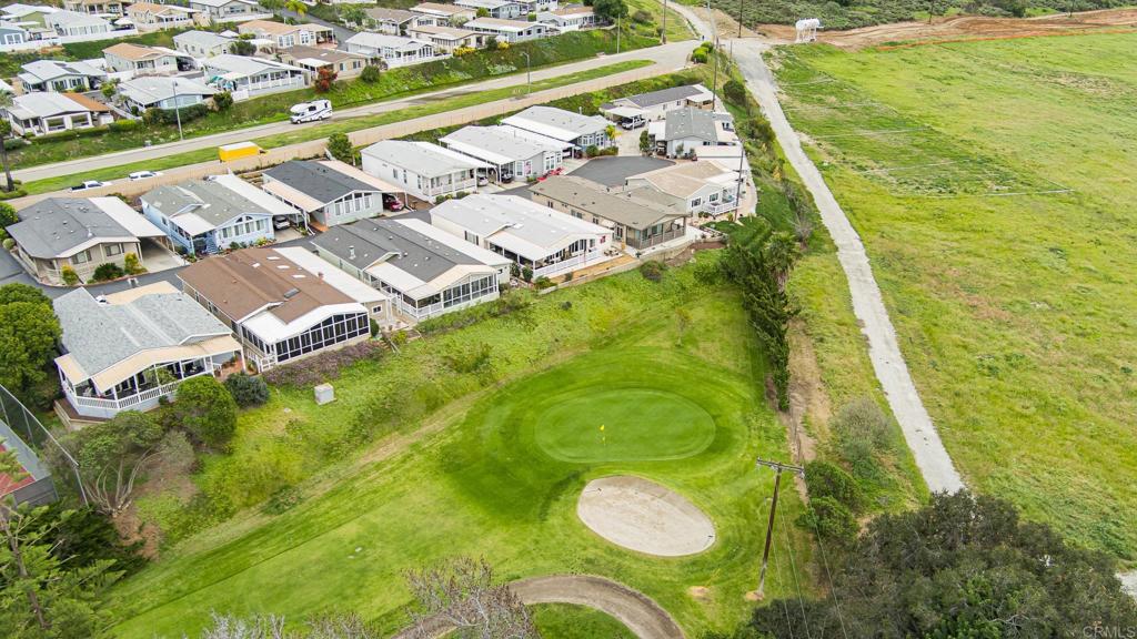 4650 Dulin Road, Unit 229 Fallbrook, CA 92003 - Photo 30 of 53 a view of swimming pool with a yard