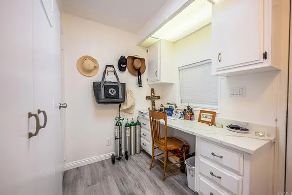a bathroom with a toilet a sink and a mirror