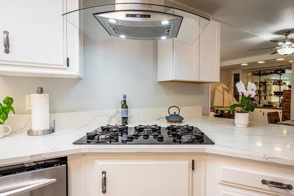 a kitchen with a sink and a window