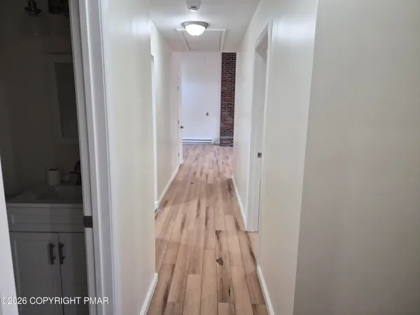 a bathroom with a sink and toilet