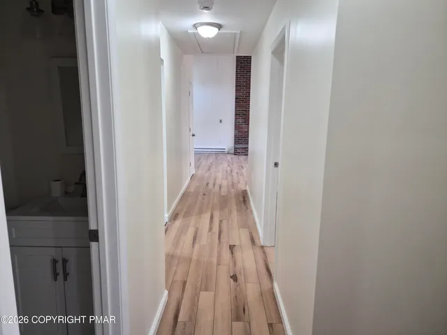 a bathroom with a sink and toilet