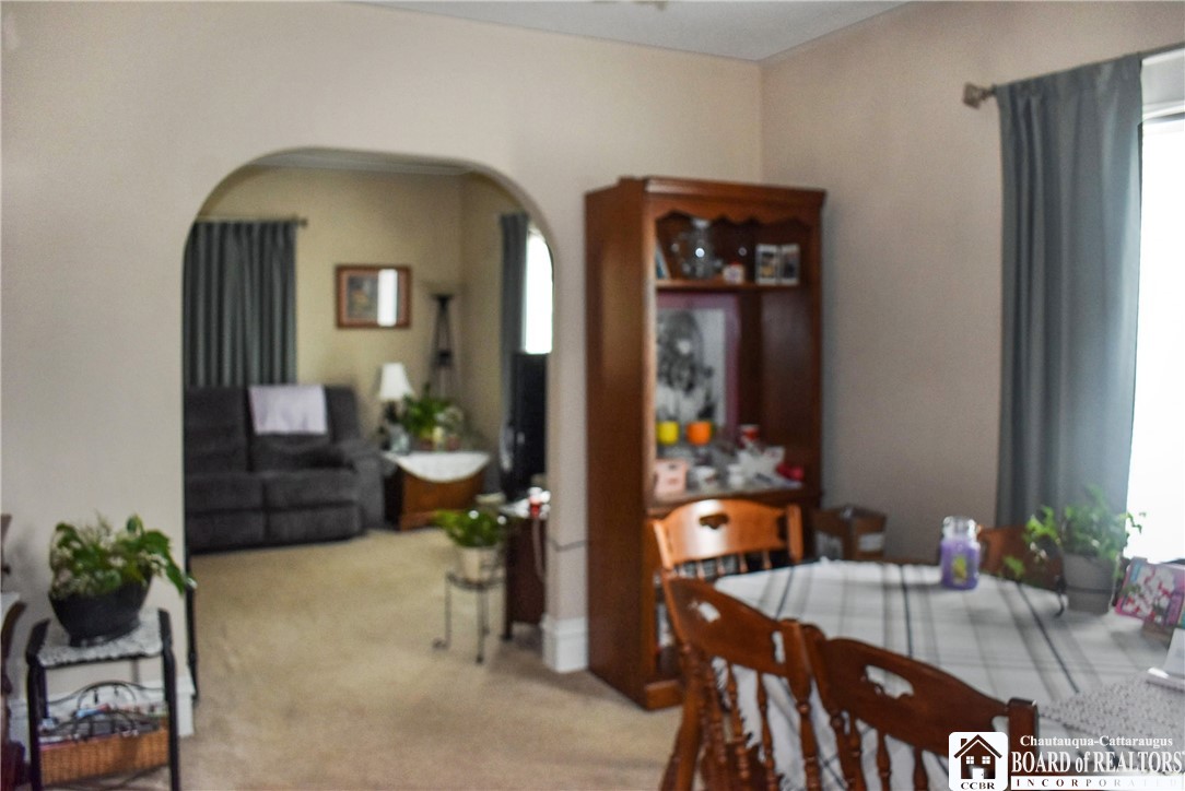 79 Pershing Avenue Jamestown, NY 14701 - Photo 25 of 31 First floor Dining room leading to Living Room