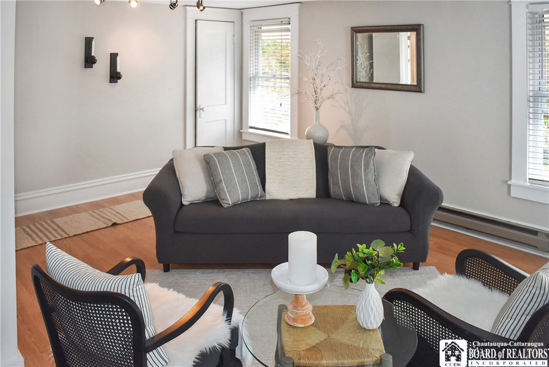 79 Pershing Avenue Jamestown, NY 14701 - Photo 8 of 31 Dining/ living area with laminate floors on 2nd fl