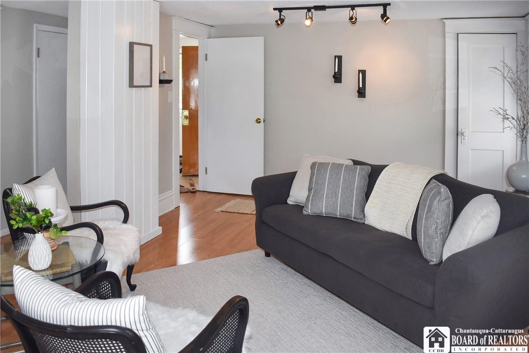 79 Pershing Avenue Jamestown, NY 14701 - Photo 9 of 31 Living Room on 2nd floor appartment with Laminate