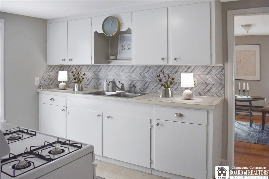 79 Pershing Avenue Jamestown, NY 14701 - Photo 10 of 31 2nd floor Kitchen with lots of cupboards