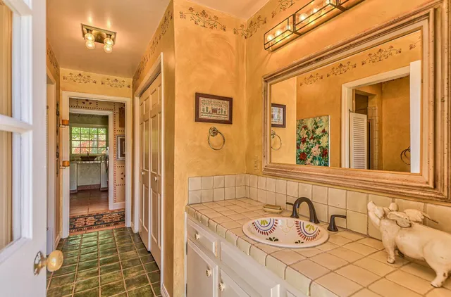 a view of a balcony with wooden floor and city view
