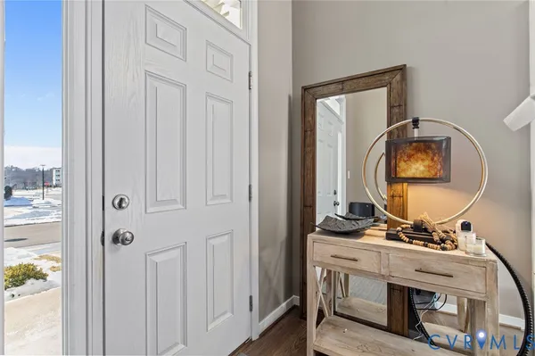 a view of living room with wooden floor
