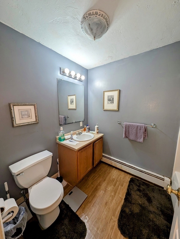 83 Haggerty Road Charlton, MA 01507 - Photo 26 of 32 a bathroom with a toilet sink and mirror