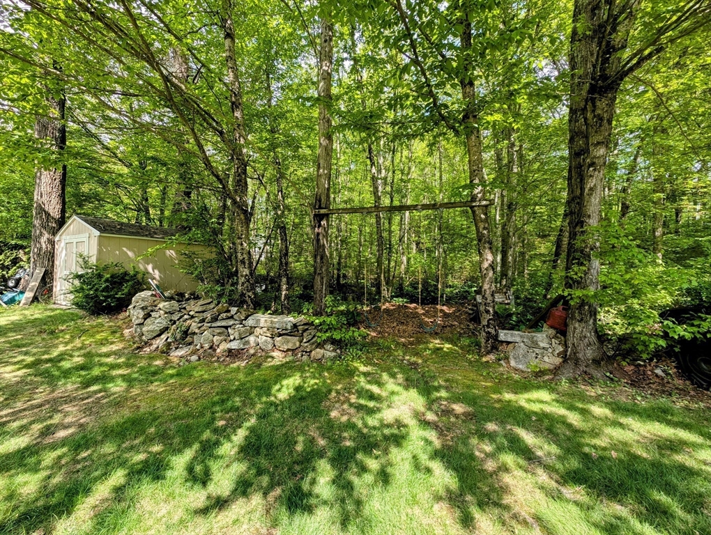 83 Haggerty Road Charlton, MA 01507 - Photo 30 of 32 a view of backyard with green space