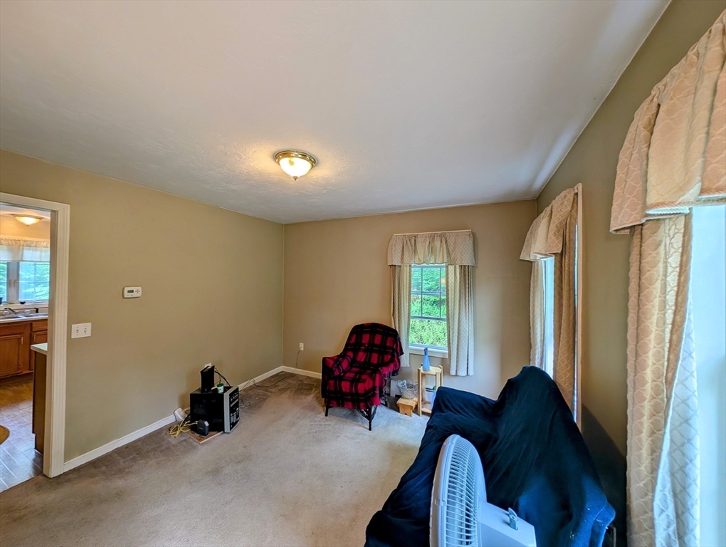 83 Haggerty Road Charlton, MA 01507 - Photo 6 of 32 a living room with furniture and a window