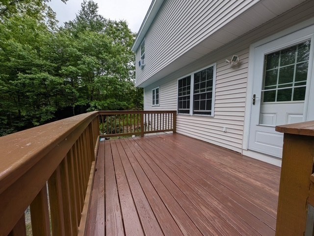 83 Haggerty Road Charlton, MA 01507 - Photo 8 of 32 a view of deck with wooden floor and fence with a wooden floor