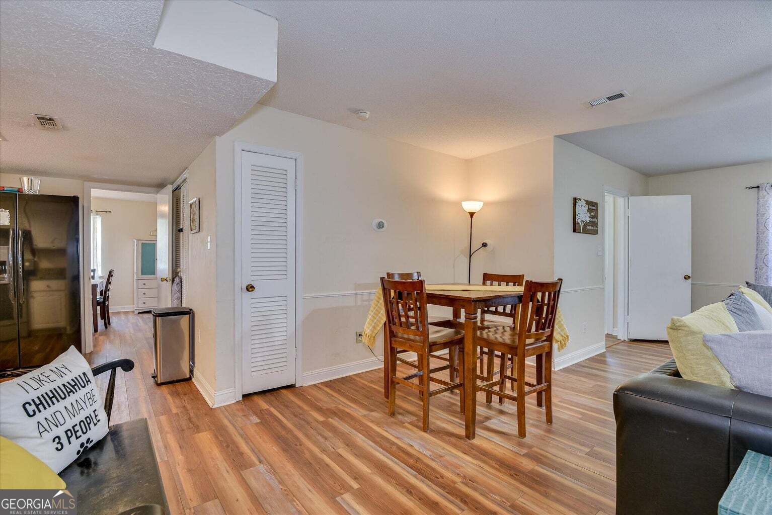 306 Pleasant Home Road Augusta, GA 30907 - Photo 14 of 57 a dining room with furniture and wooden floor