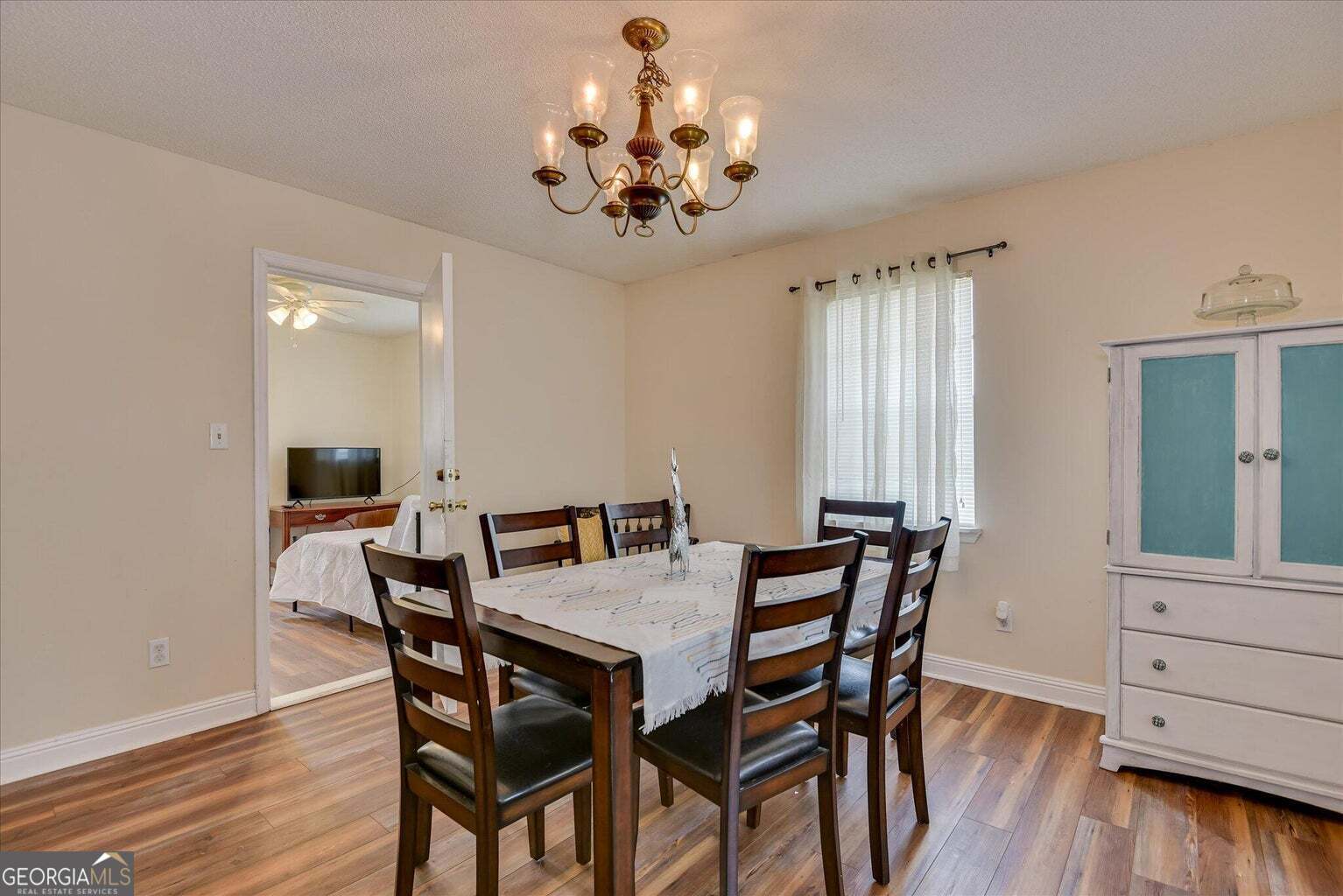 306 Pleasant Home Road Augusta, GA 30907 - Photo 20 of 57 a view of a dining room with furniture and wooden floor