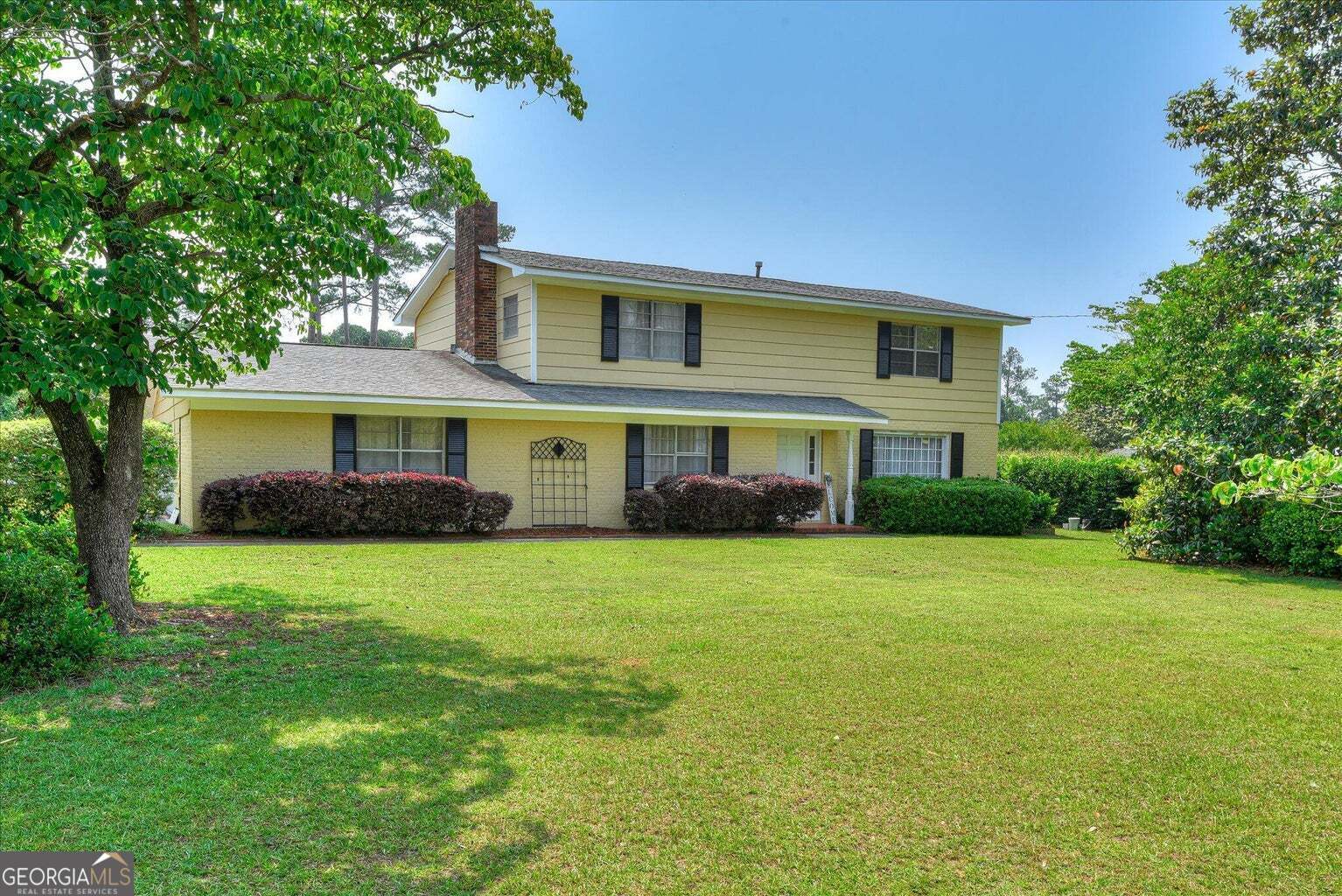 306 Pleasant Home Road Augusta, GA 30907 - Photo 2 of 57 a front view of a house with a yard