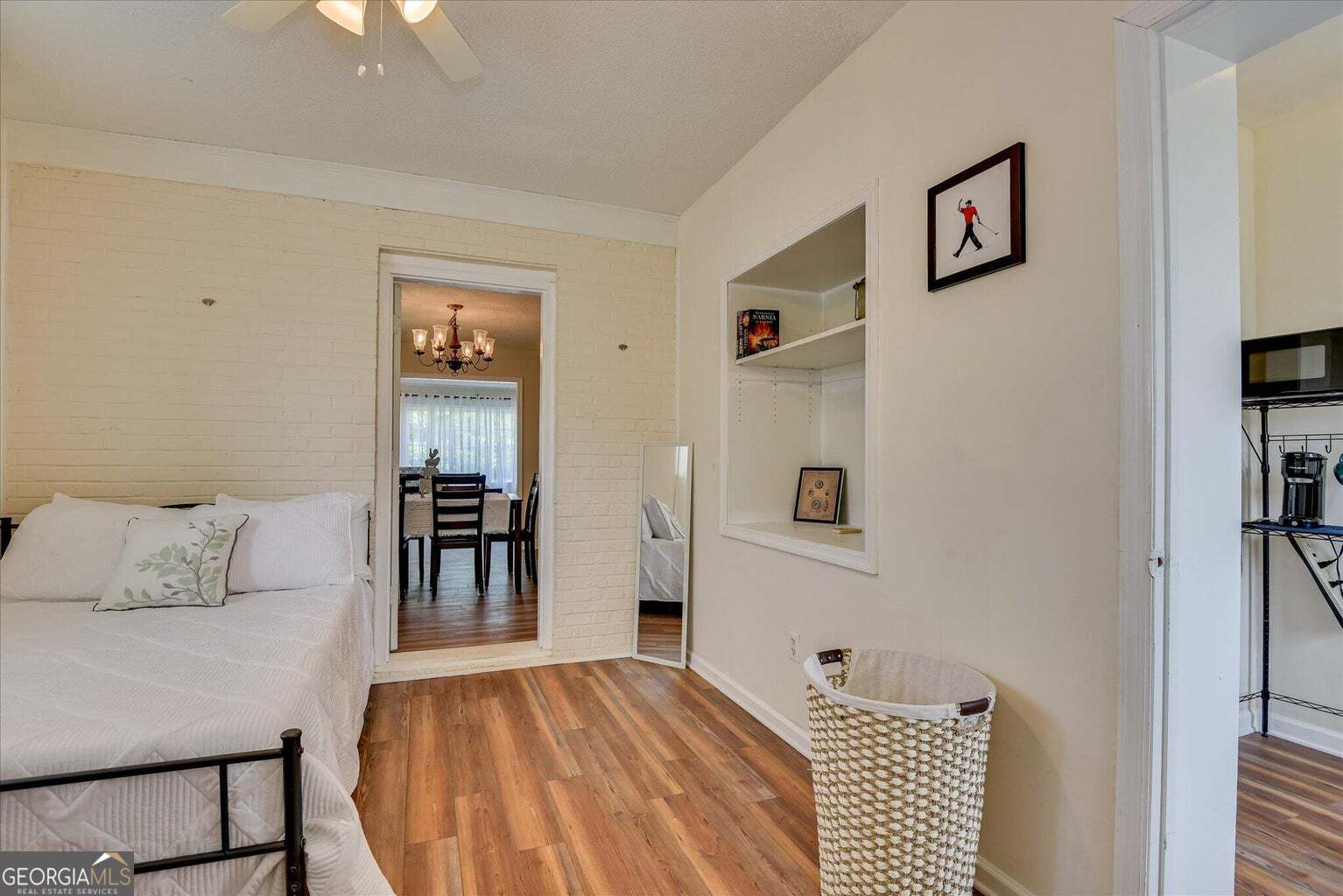 306 Pleasant Home Road Augusta, GA 30907 - Photo 29 of 57 a room with a bed and wooden floor
