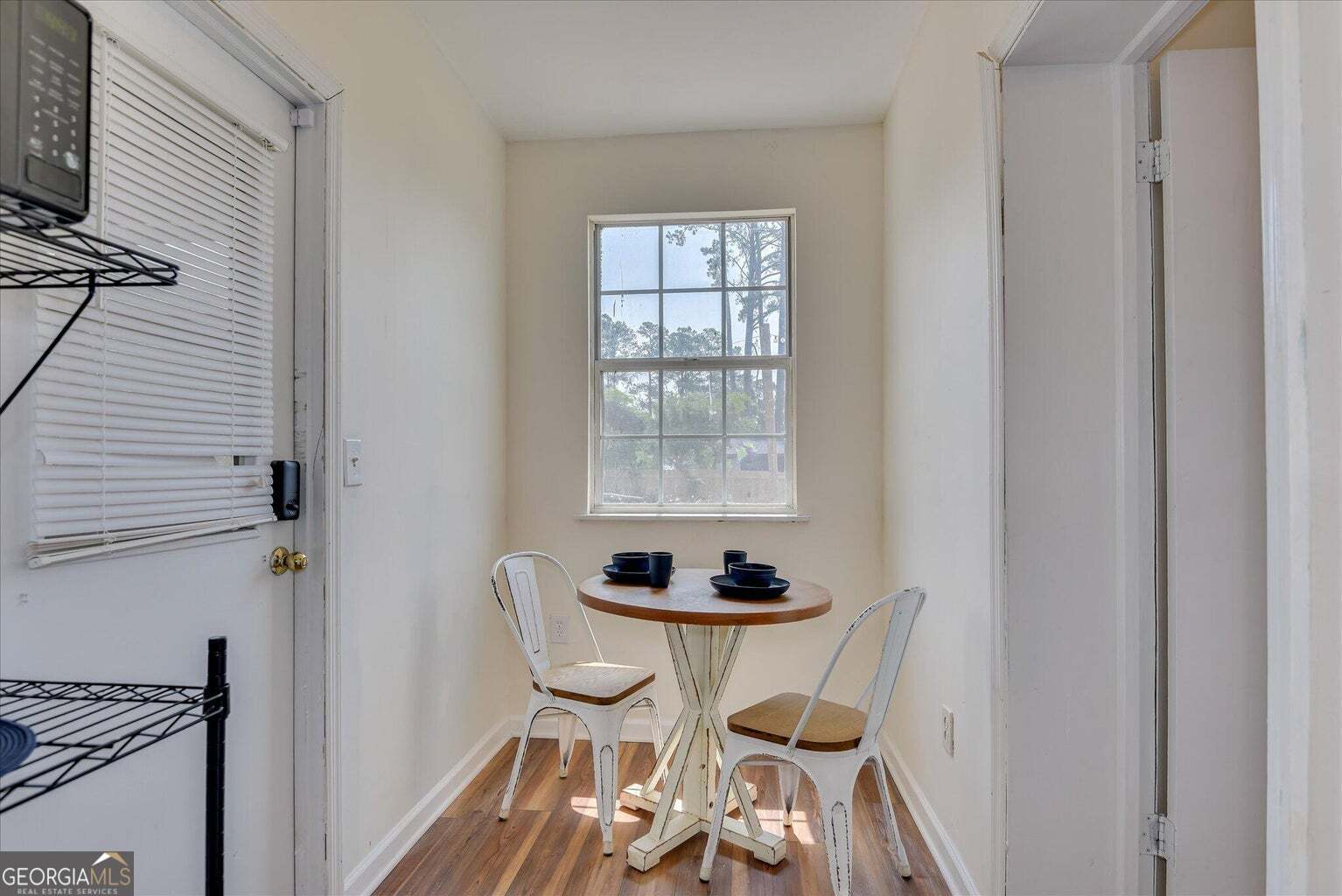 306 Pleasant Home Road Augusta, GA 30907 - Photo 32 of 57 a dining room with furniture and window