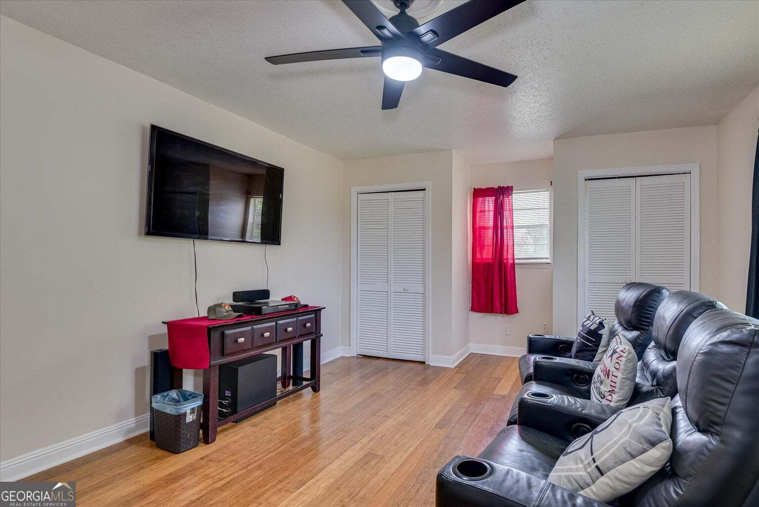 306 Pleasant Home Road Augusta, GA 30907 - Photo 43 of 57 a living room with furniture and a flat screen tv