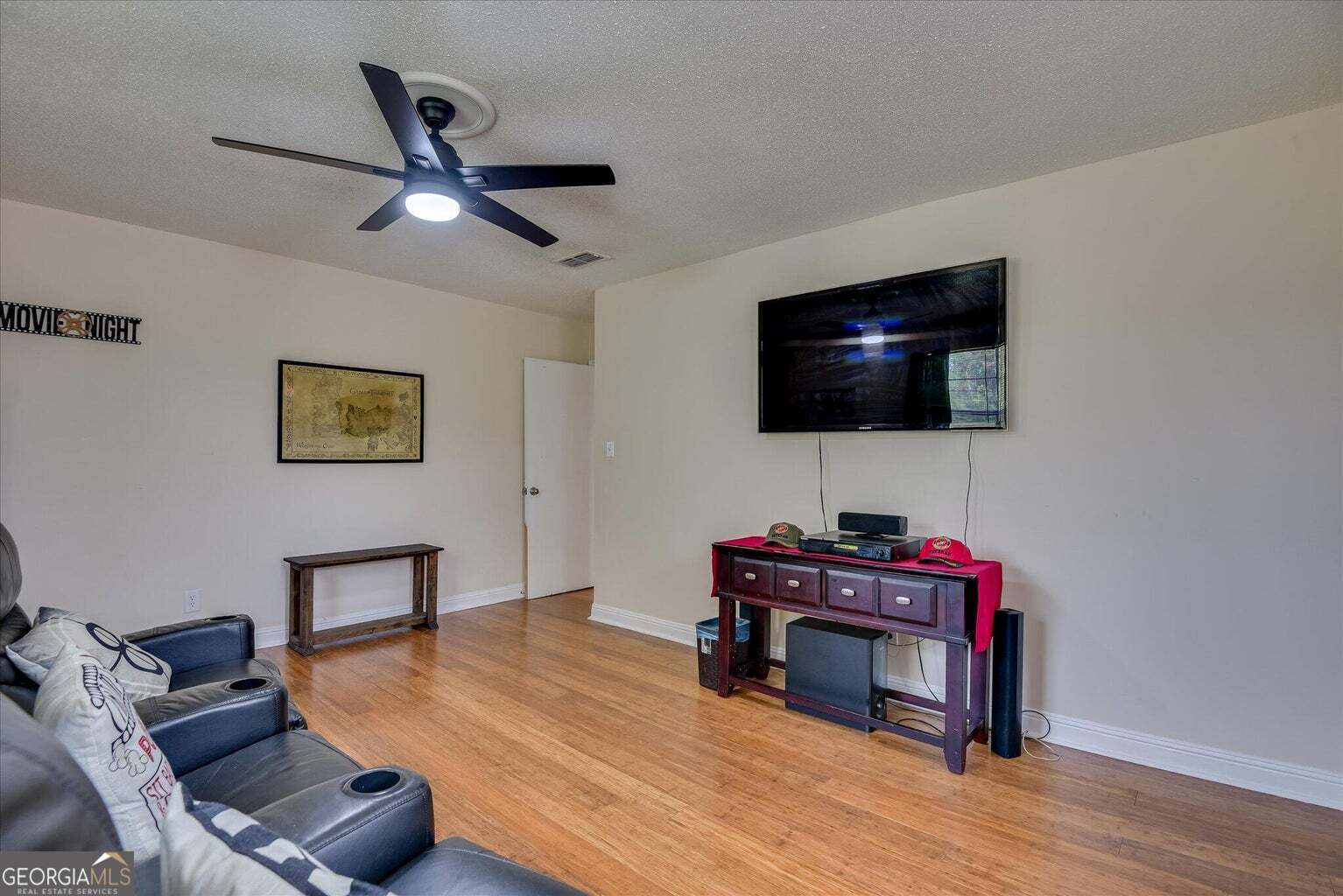306 Pleasant Home Road Augusta, GA 30907 - Photo 44 of 57 a living room with furniture and a flat screen tv