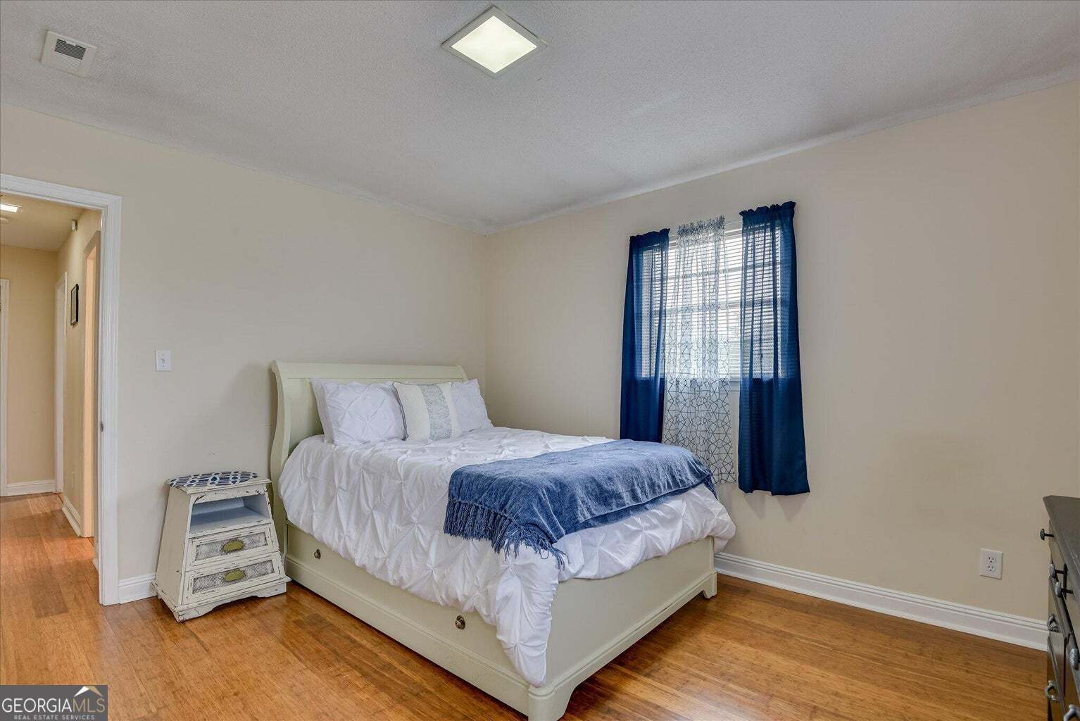 306 Pleasant Home Road Augusta, GA 30907 - Photo 47 of 57 a bedroom with a bed and wooden floor